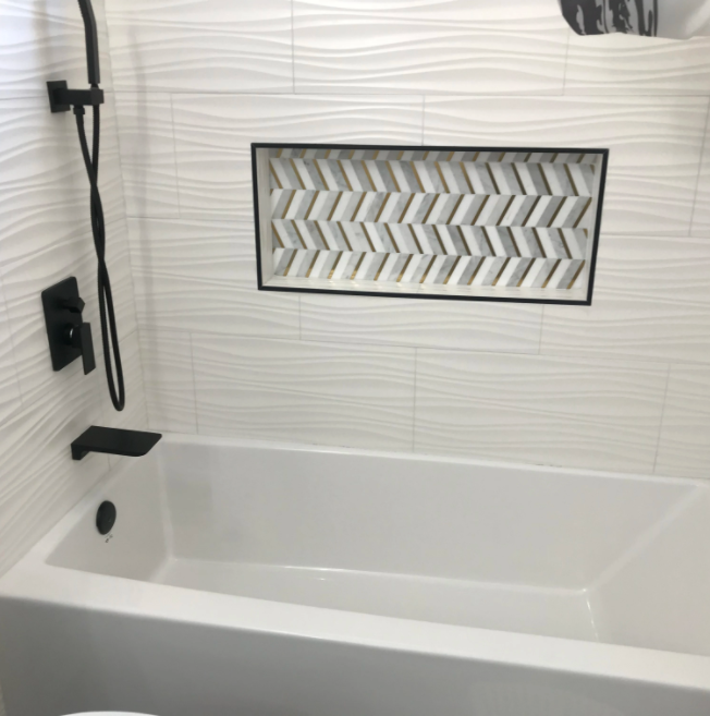 Bathtub with black showerhead