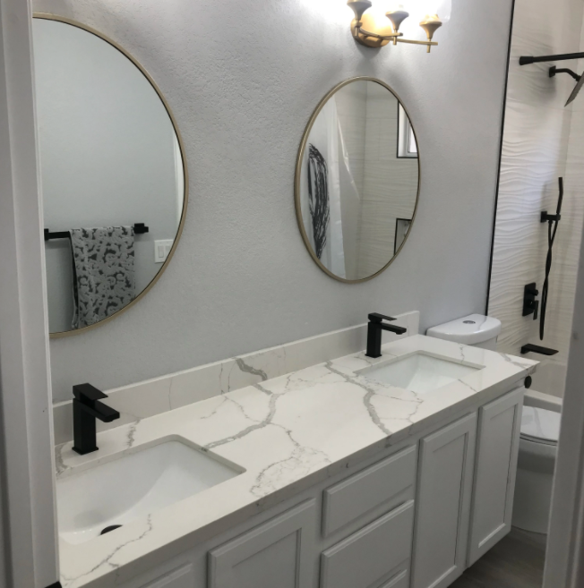 Marble bathroom with two mirrors